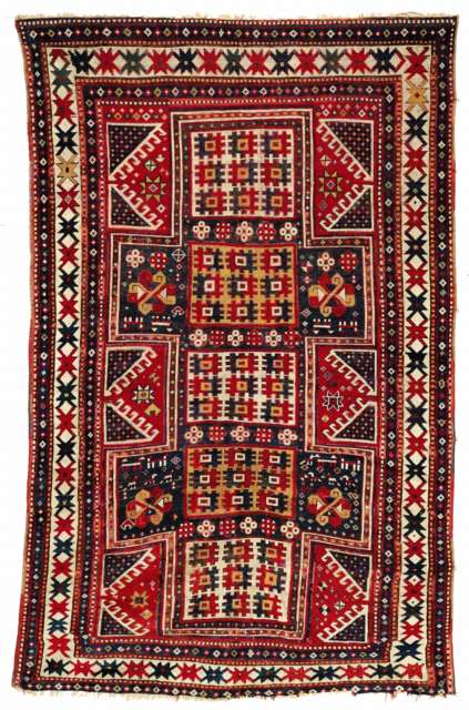 Oriental Rugs/Caucasian Rugs: A 19th c. Seljuk Rosette Kazak rug Bordjalu region of the Kazak region in the Caucasus. The region takes it names from the Bordjalu Khanate which takes it name from the Bordjalu tribe. The Bordjalu tribe are the descendents of the 10,000 men Cingis Qan (Ghengis Khan) gave to his close friend and ally Boro'cu. At some point the tribe left the authority of the Mongol Il and at that point they were Kazak.