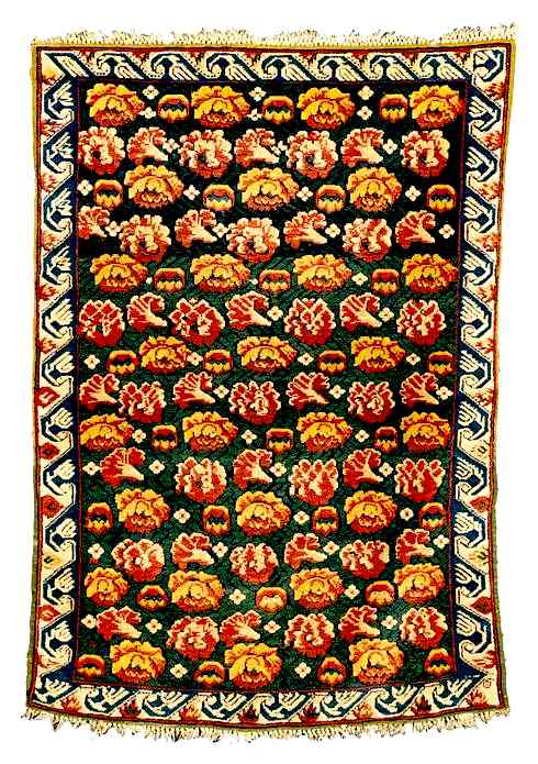 A Seychour Cabbage Rose Rug lot 47 