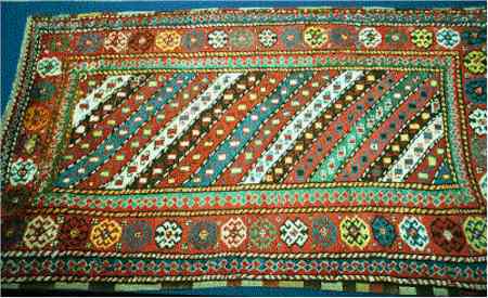 Ganja Rugs: Antique Diagonal Striped Gendge rug 