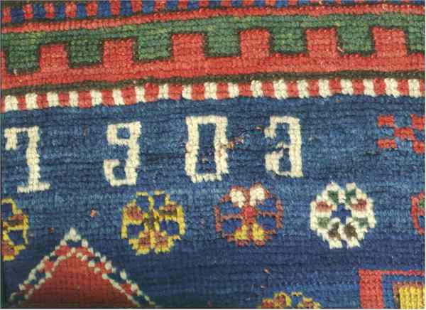 Armenian Rugs: Inscribed 1903 Armenian "Akstafa" Carpet Oriental Rugs: Inscribed Armenian Carpet: This rug is the product of an Armenian weaver in Karabagh in 1903. I say that because the rug is what we would call Karabagh. The date is obvious because the rug bears that date. The Armenian attribution is due to the date written as 1903. Eiland in Weavers, Merchants and Kings, Inscribed Rugs from Armenia makes a convincing argument for an Armenian Attribution for this type of rug. James "Uncle Jimmy" M. Keshishian concurs in his book Inscribed Armenian Rugs of Yesteryear. Of course Max and I took this rug down to Uncle Jimmy and he called this "definitely Armenian" and he compared it to plate A-169 in his Inscribed Armenian Rugs of Yesteryear.