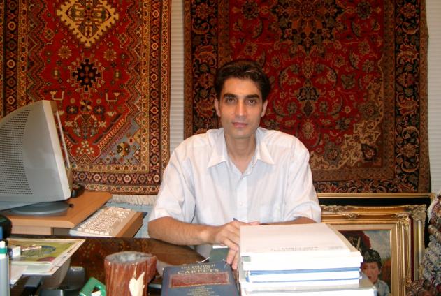 Isfahan Rugs Persian Rugs Majid, one of the Malakouti sons in their retail shop in Dubai, UAE