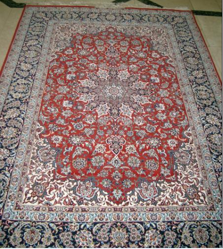 Isfahan Rugs Persian Rugs The Malakouti signed Isfahan carpet made by Mr. Malakouti. The carpet size is 245x165 cm, it has a wool pile with silk inlay. The base is all silk. Knot density is 12k/cm ~ 930kpsi.