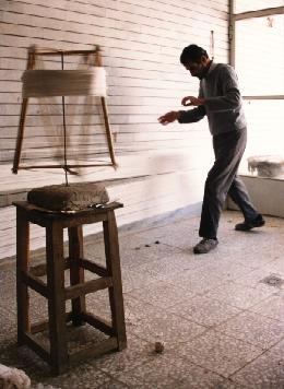 Isfahan Rugs Persian Rugs Mr. Malakouti (the father) preparing the base, (laying out the warps
