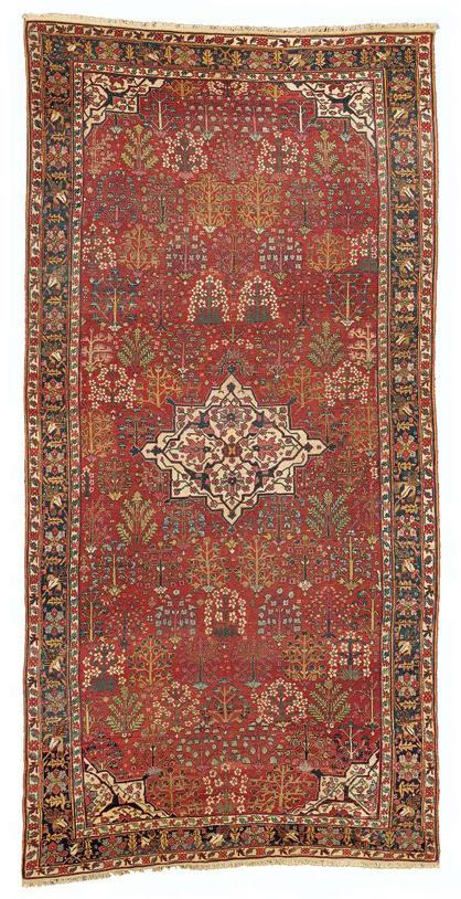 Persian Rugs/Kurdish Rugs: Kurdish Northwest Persian Shrub and Medallion Carpet late 18th c. Sotheby's lot 186 